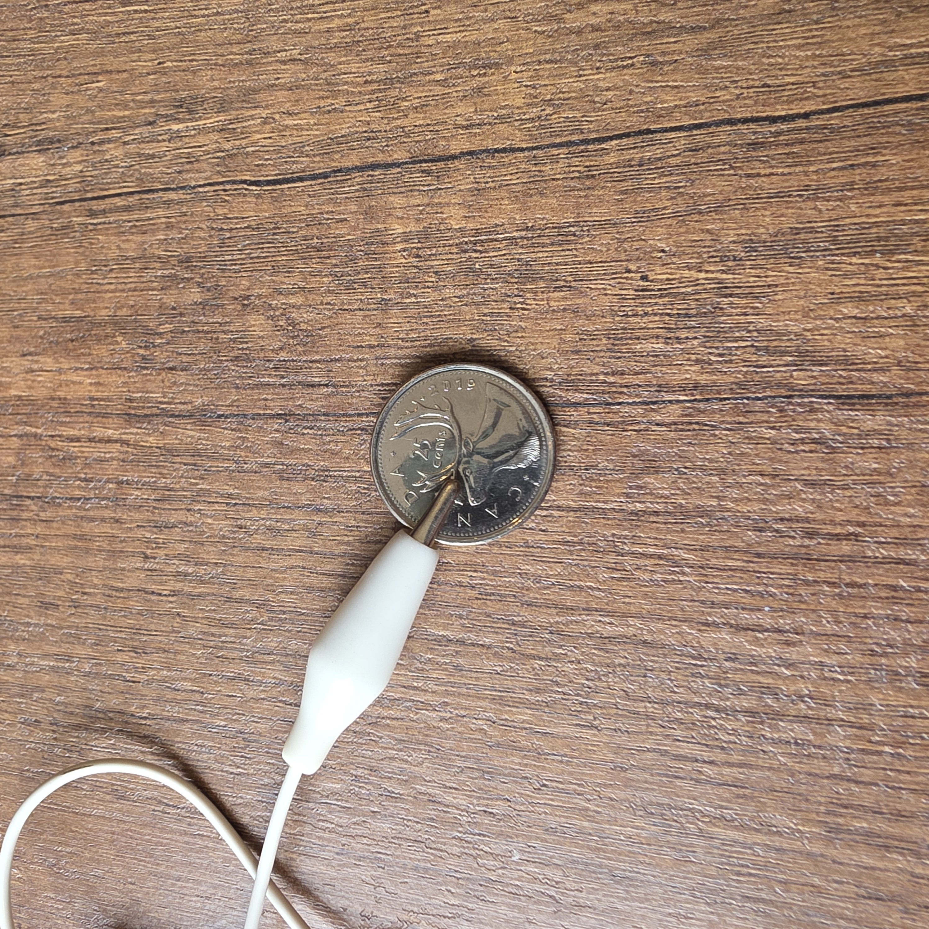 Seeing if coins are conductive which they are