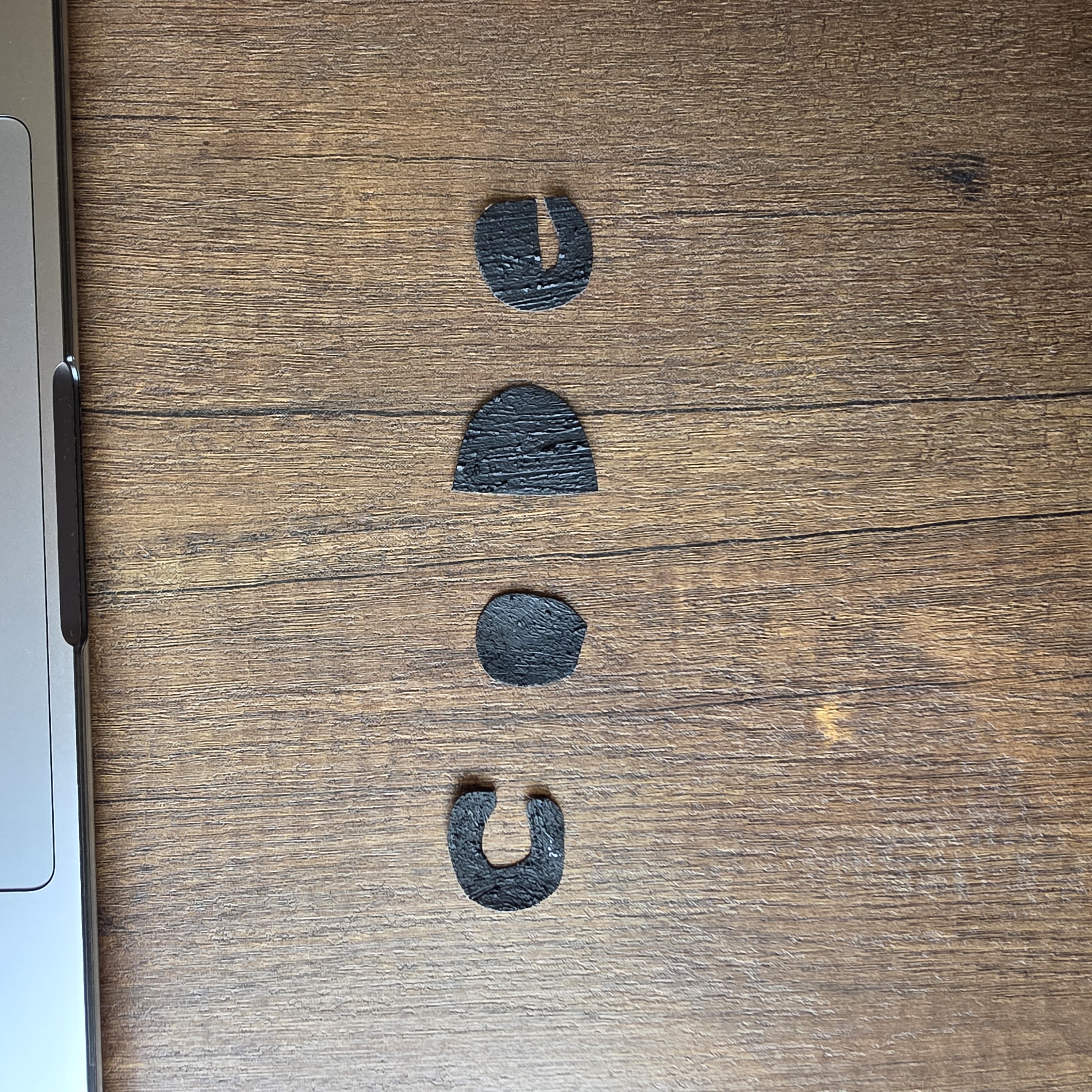 Cutting out the words code in conductive paint